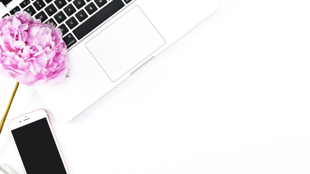 Flatlay with a laptop and cellphone